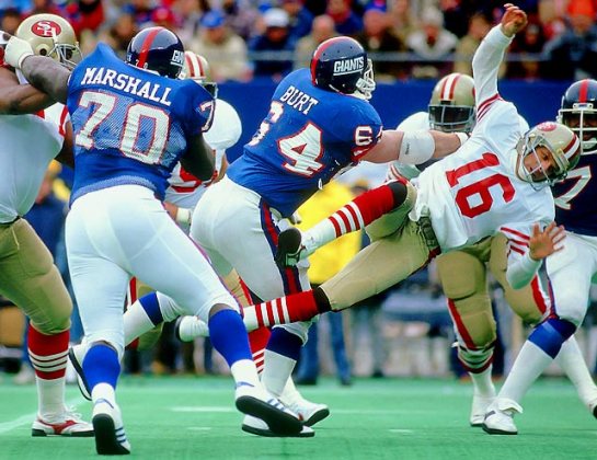 Jim Burt knocking Joe Montana out with a concussion in their 49-3 rout in the '86 playoffs.