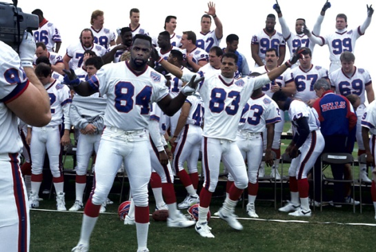 The Buffalo Bills clowning around on Super Bowl picture day before XXV.