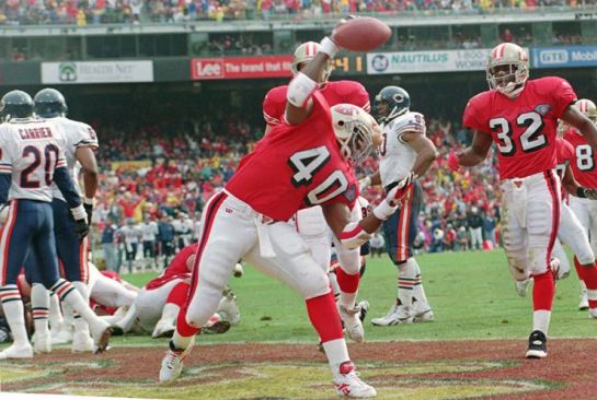 Floyd and Watters celebrate touchdown during their 44-15 demolition of Chicago in the '94 playoffs.